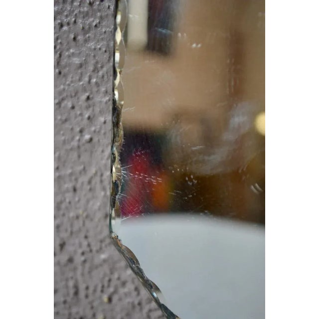 Both octagonal, here is a pretty pair of vintage mirrors with art deco accents. They have a nice beveled and serrated...