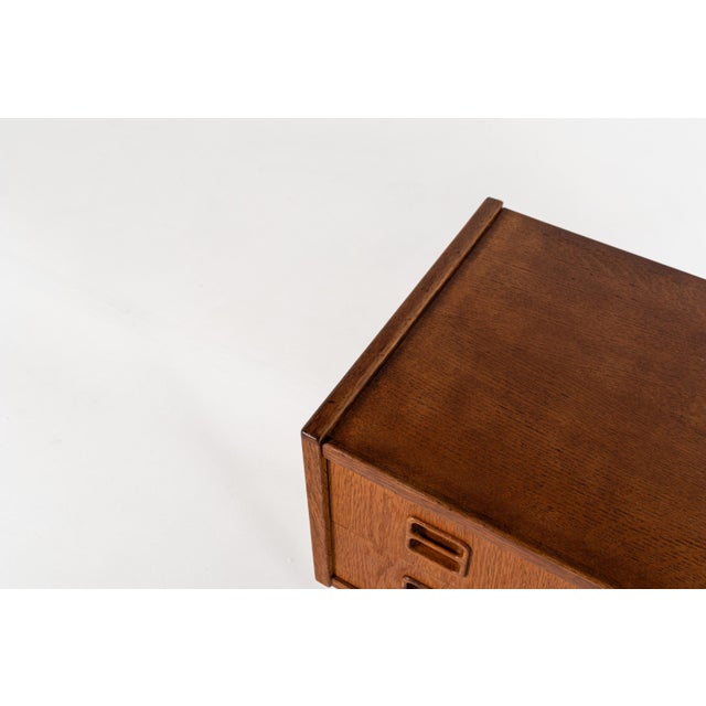 Beautiful Danish mid century modern sideboard from the 1960s, crafted in oak with a warm, natural grain and elegant...