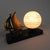 An ideal gift for a sailing friend. Height: 14 cm. Width: 20 cm. Depth (=Ø globe): 10 cm. Dimensions marble base: 2x8x20...