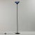 Postmodern style floor lamp from the 1980s. The lamp gives off a warm, soft light, making it an excellent choice for mood...