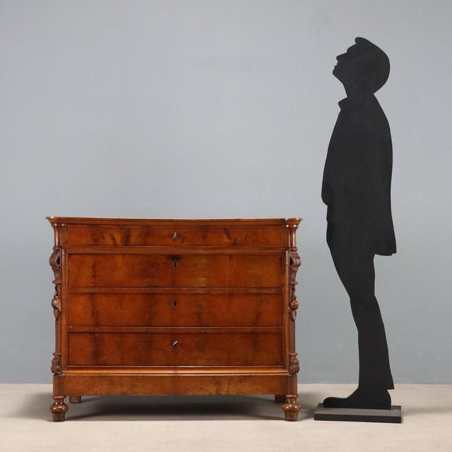 Charles X Genoese chest of drawers, veneered in mahogany and plum mahogany. Shaped top, four-drawer front entirely...