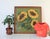 Vintage sunflower needlepoint wall hanging in a wood frame. No makers mark. Some light age wear to wood frame. Ready to hang.