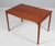 Ole Wanscher coffee table of mahogany. Made by A. J. Iversen. This piece is attributed to the mentioned designer/maker. It...