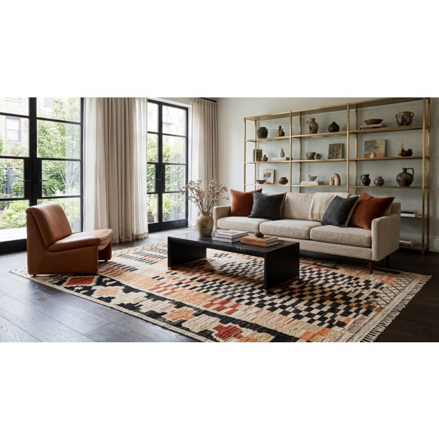 Elevate your space with this modern Moroccan-style wool rug, showcasing an asymmetrical design that blends traditional...