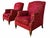Offered here is a pair of lounge chairs by Baker Furniture. Each chair is upholstered in a red velvet textile and down-...