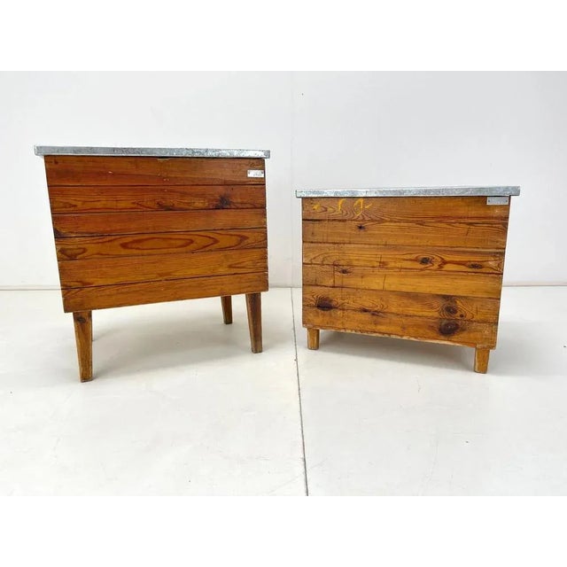 Vintage industrial wooden chest with metal top in original condition. Can be used in various ways. The taller box is 63 cm...