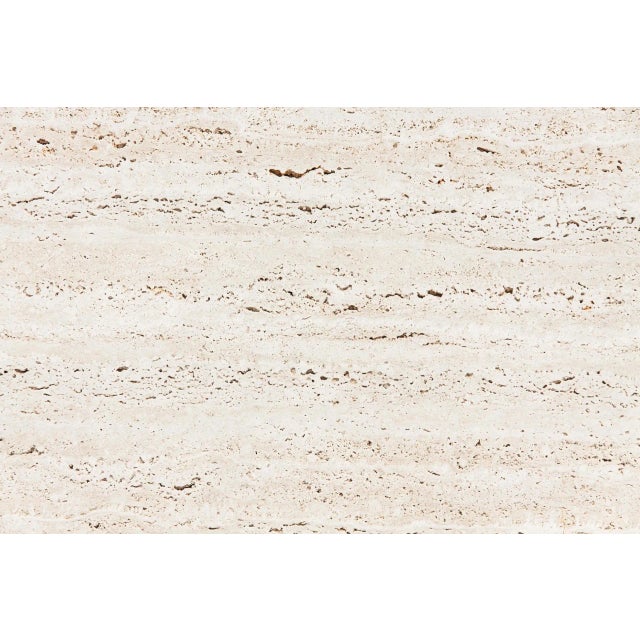 After a careful selection of top quality travertine, the sink is made from a single solid block and worked with numerical...