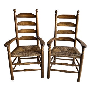 Pair of Vintage Shaker Style OakLadder Back Rush Seat Arm Chairs For Sale