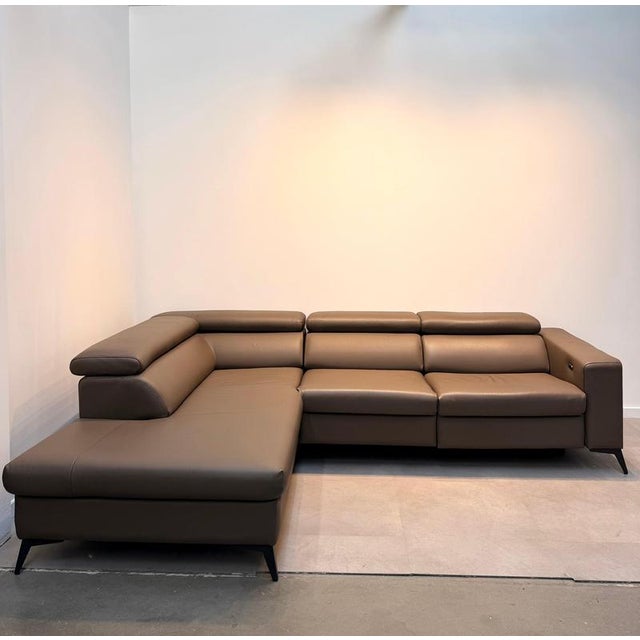 Contemporary modular corner sofa by Gova, upholstered in a beautiful taupe/brown leather. This elegant and comfortable...