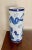 Blue and white traditional 10” high tubular ceramic vase with handpainted scenery design. Great for a mantel or side table...