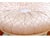 A premium, bench-made upholstered tuffet ottoman by the renowned design house MacKenzie-Childs, showcasing the brand's...
