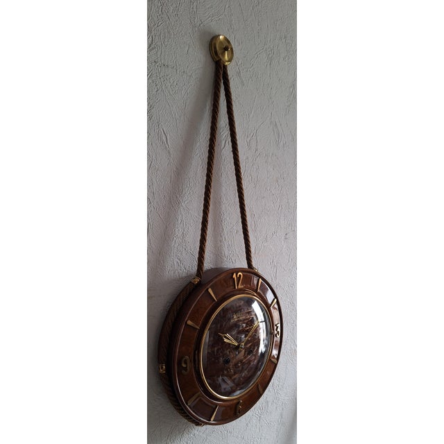 Mid-Century Mechanical Wall Clock with Floating Anchor from Garant, 1950s, in Very Good conditions. Designed 1950 to 1959...