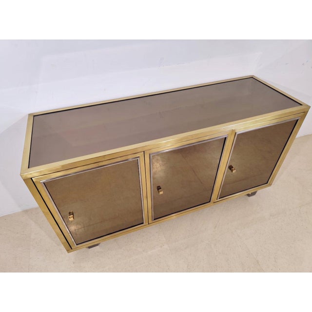 Mid-century modern buffet by michel pigneres for l'angolo metallarte roma. Features coated bronze mirrors, brass, and...