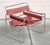 This armchair channels the essence of Marcel Breuer's renowned Wassily chair. Crafted in Italy and purchased in the 1960s,...