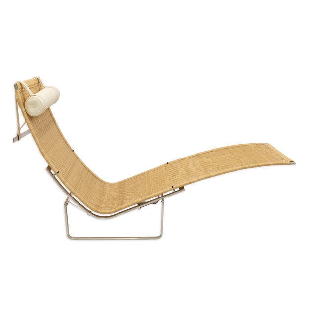 This PK24 chaise longue, designed by Poul Kjærholm for Fritz Hansen, embodies the Danish master’s commitment to refined...