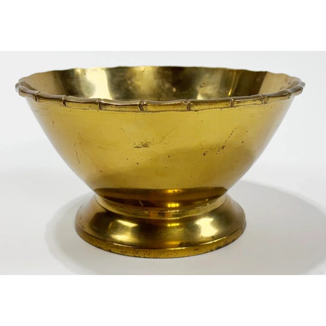Large vintage brass bowl with detailed faux bamboo rim and round pedestal base. Lovely patina. Minor scratches.