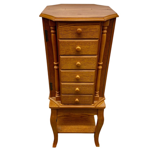 Bring this freestanding jewelry armoire into your home and control your jewelry clutter in style! Jewelry Armoire In Oak...