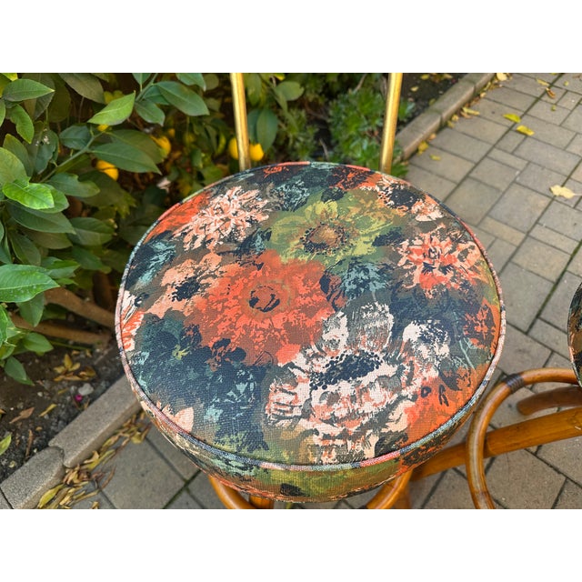 Mid-century rattan barstools featuring a steam bend "Spiral" base and vibrant typical MC flower vinyl upholstery fabric...