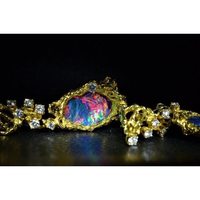 The Stella Arthur King Ear Pendants Set with Opal and Diamonds and Fancy Colored Diamonds. These 2 inch long earrings are...