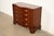 An exceptional Georgian or Chippendale style serpentine front dresser or chest of drawers By Baker Furniture, "Historic...