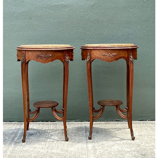 This exquisite pair of side tables captures the romantic essence of French Provincial design, featuring the graceful...