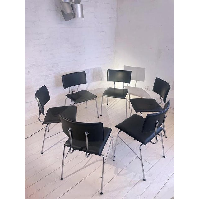 Discover this exceptional set of six Sparta dark gray leather chairs, designed by Christoph Hindermann for the renowned...