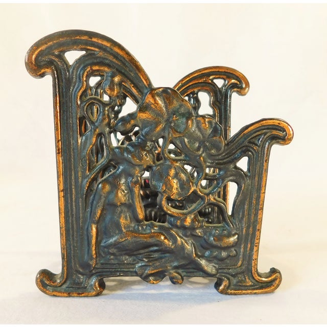 Wonderful vintage mid century figural nude woman cast metal napkin or letter holder. Great piece! Ornate design with...