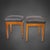 A beautiful pair of stools from the Biedermeier period, circa 1825, crafted from solid cherry wood. The clean lines, warm...