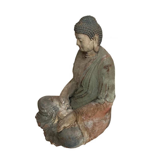 This is a Chinese decorative wooden Sitting Buddha Gautama Amitabha Shakyamumi statue. It is finished with a vintage...