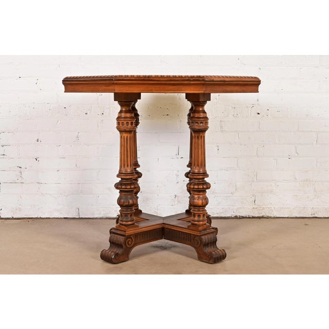 An outstanding antique Eastlake Victorian parlor table or occasional side table In the manner of Herter Brothers USA,...