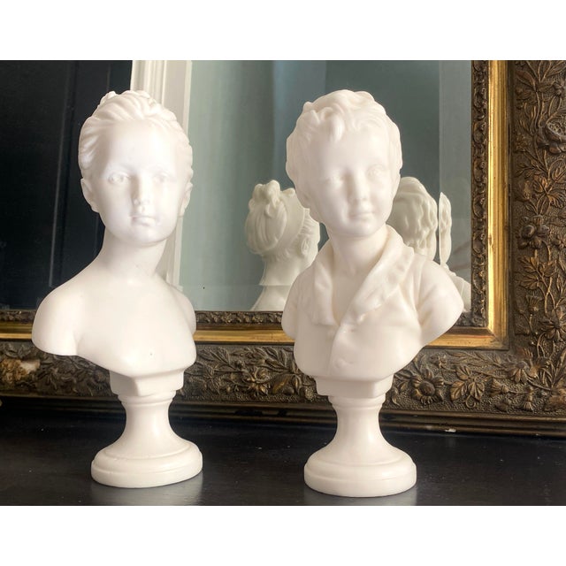 Sculptures depicting Louise and Alexandre Brongniart, children of the French architect Alexandre Théodore Brongniart. They...
