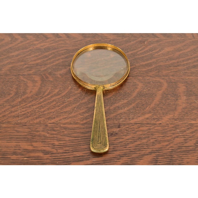 A rare and exceptional antique Art Deco or Arts & Crafts period gilt bronze Graduate pattern magnifying glass By Tiffany...
