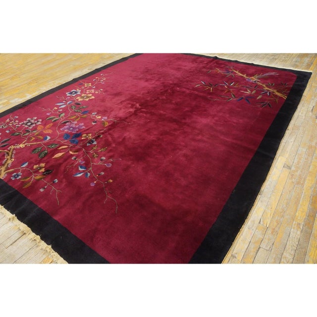 Rectangle Red Wool 1920s Antique Hand Knotted Pile Rug, Circa Date: 1920s. This striking piece exemplifies the height of...