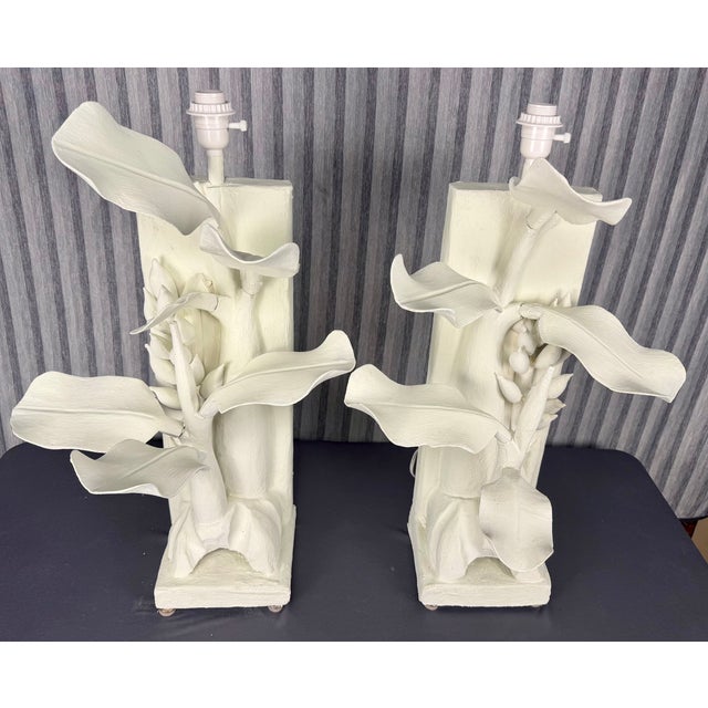 Fabulous pair of hand carved wood Banana Plant Lamps finished in white plaster. Dating from about the 1990s?, the plaster...