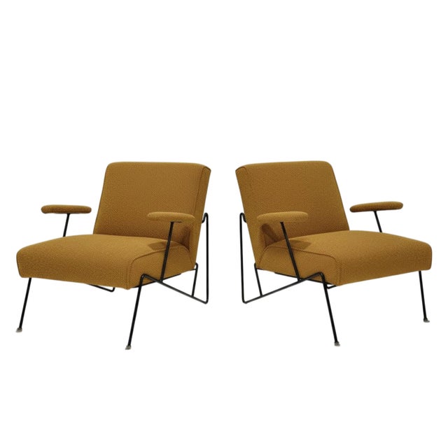 Designed by Dan Johnson in the 1950s, made by Pacific Iron. The chairs boast a sculptural iron frame and an upholstered...