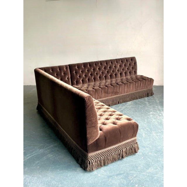 Embrace unparalleled luxury with this show-stopping vintage sectional sofa, a masterful example of 1970s Hollywood Regency...