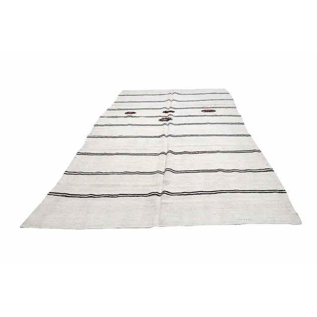 Handwoven vintage hemp kilim rug from Yozgat region of Turkey. Approximately 45-55 years old. In very good condition.