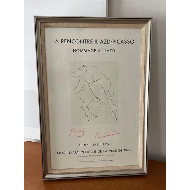 Framed poster of a showing for Pablo Picasso. French and written in the language, the attraction here is the tone on tone...