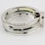 Emilio Pucci designed this stunning stacked bracelet bangle set, crafted from silvered metal, acrylic, and silk. The bold...