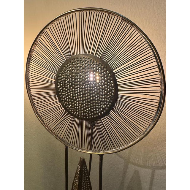 A captivating pair of French metal & brass sculptural table lamps blending brutalist metalwork with organic art-object...