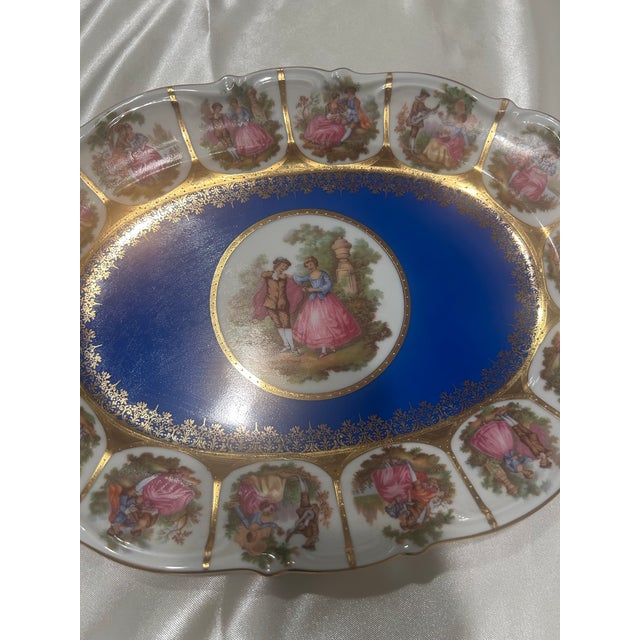 Vintage Schaller Bavaria porcelain serving tray featuring the timeless Fragonard courting couple motif. Crafted in...