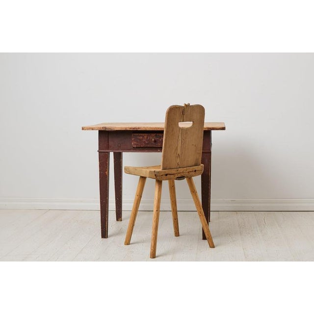 Rustic antique Swedish farm table from the early 1800s. Made by hand in northern Sweden around 1840 in gustavian style....