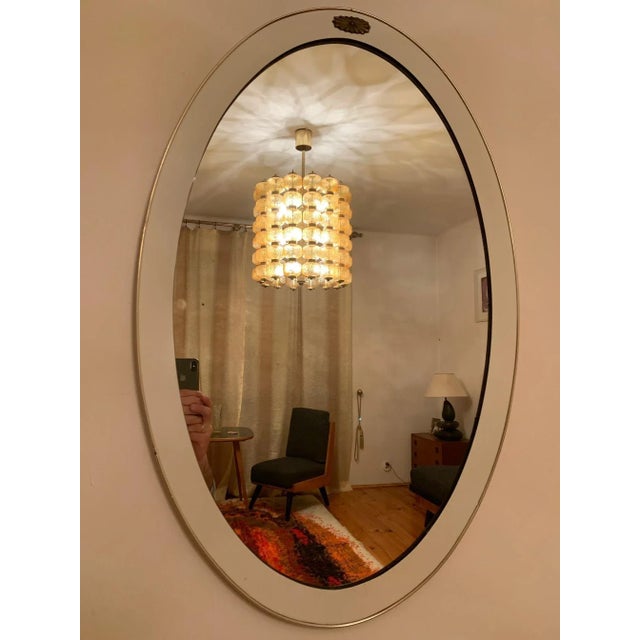 A large French mirror from the 1960s In original and very good condition. Simple, subtle form.