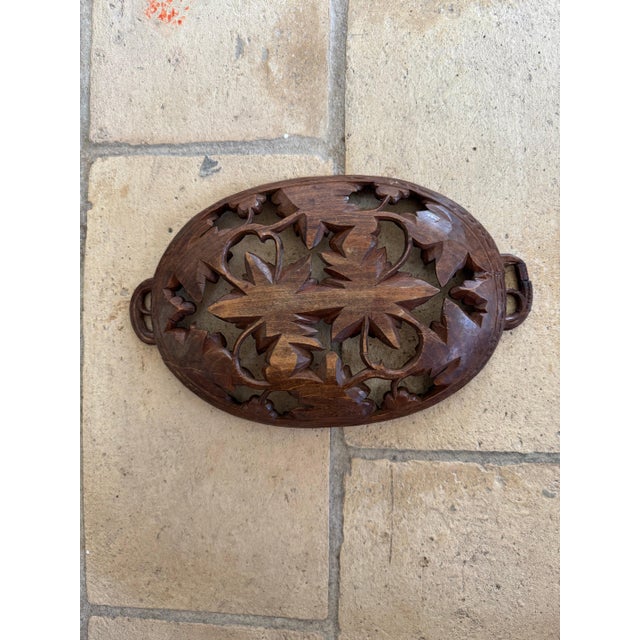 19th c Black Forest carved oval basket. 12”l x 8”h 49-072