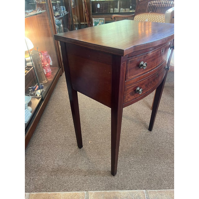 Two drawer mid 1800's mahogany with inlaid design. Comes with original key Good condition commenssurate with age. Please...