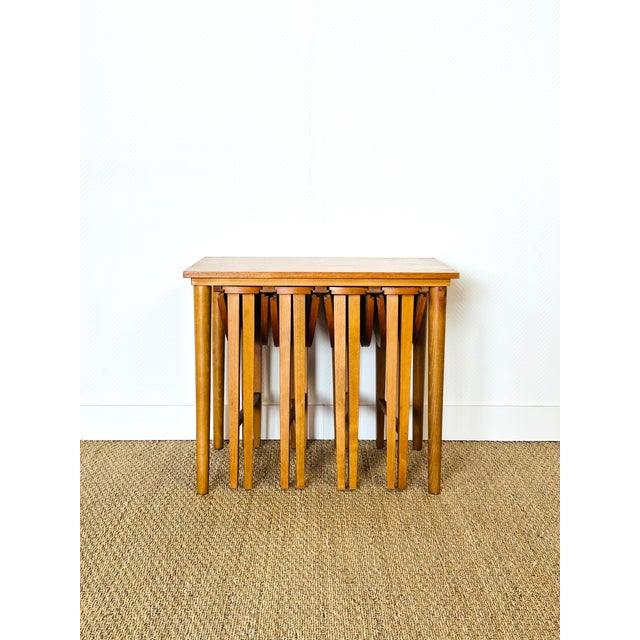 Vintage scandinavian coffee table dating from the sixties accompanied by 4 small folding side tables. dimensions: table:...