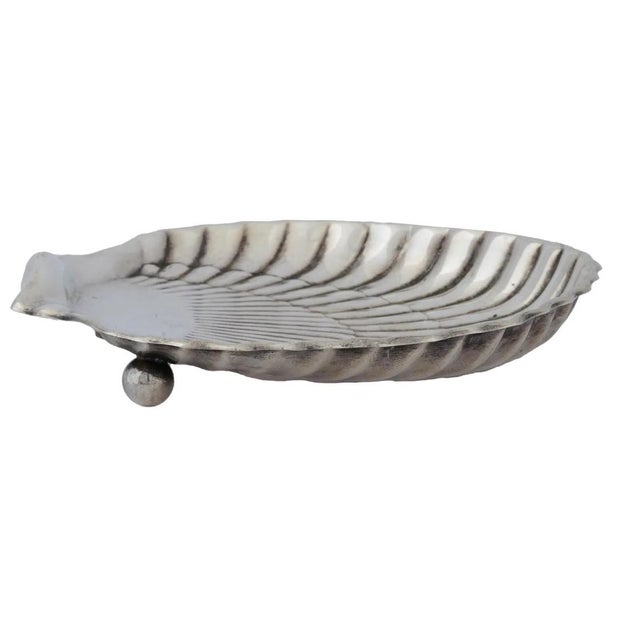 Gorham sterling silver candy dish. The beautifully detailed shell form is raised on two ball feet. How about using it to...