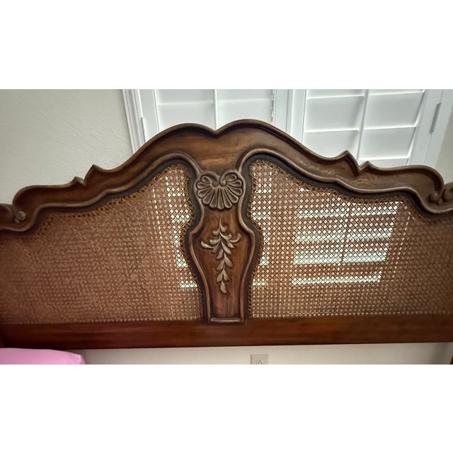 Splendid cane king headboard from the Brittany Collection by Drexel Heritage featuring a shapely arched top. Intricate...
