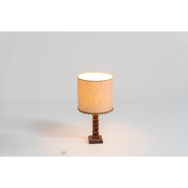 Sculptural table lamp in the manner of Charles Dudouyt (France, 1950s). This lamp offers a refined blend of beautiful...