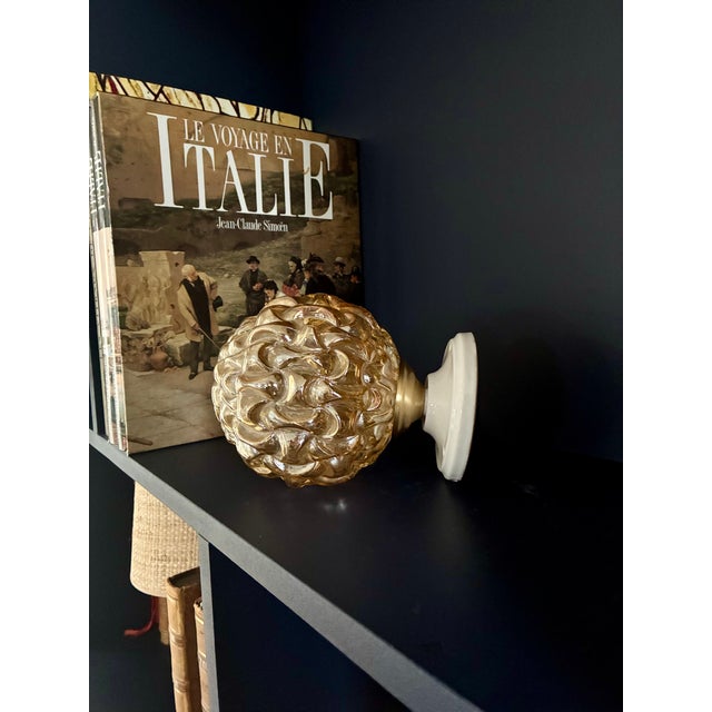 Amber glass globes in excellent condition – no chips or cracks. 1970s. cream-colored ceramic bases – in excellent...